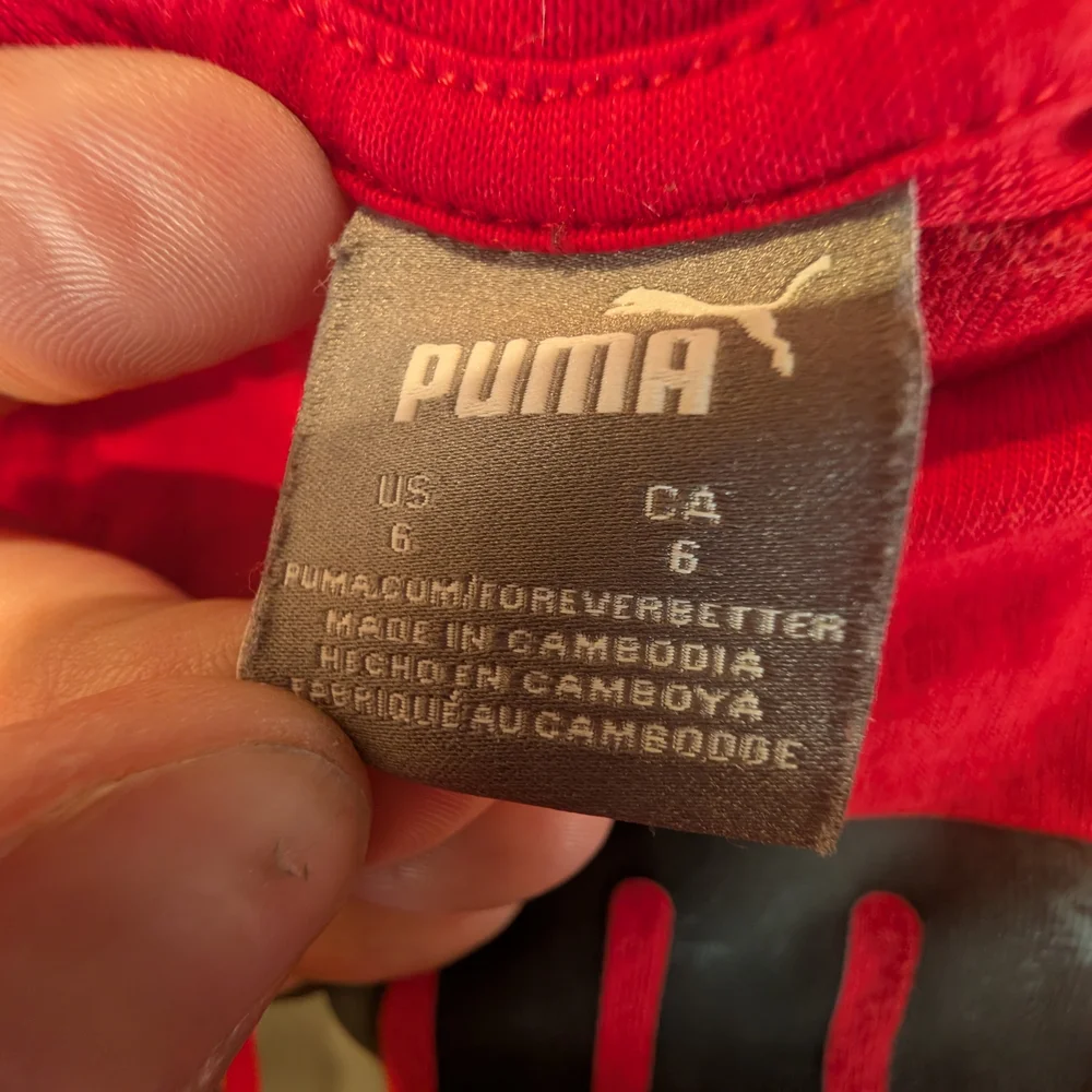 Red Apparel with Black Accents - Picture 2 of 5